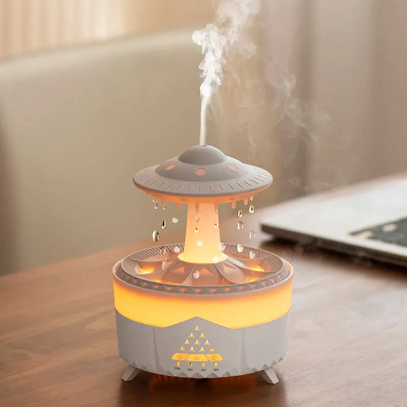  UFO-shaped humidifier emitting mist on a wooden surface with a blurred background