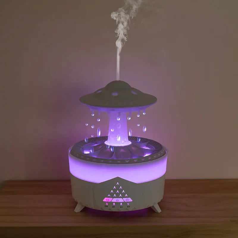 UFO-shaped humidifier emitting mist on a wooden surface with a plain background