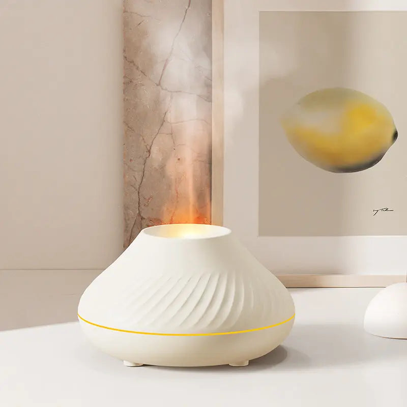 White diffuser on a table with abstract art in the background